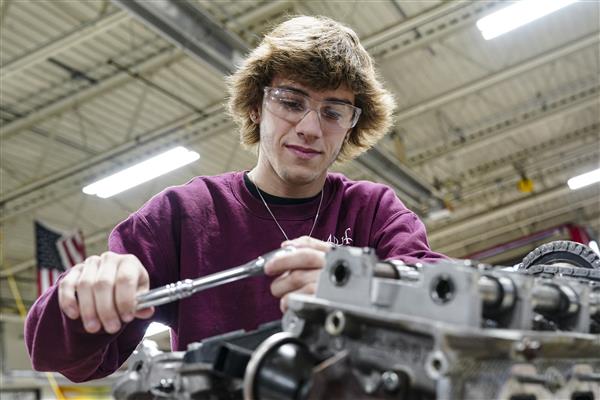 Automotive Technology student working on cars